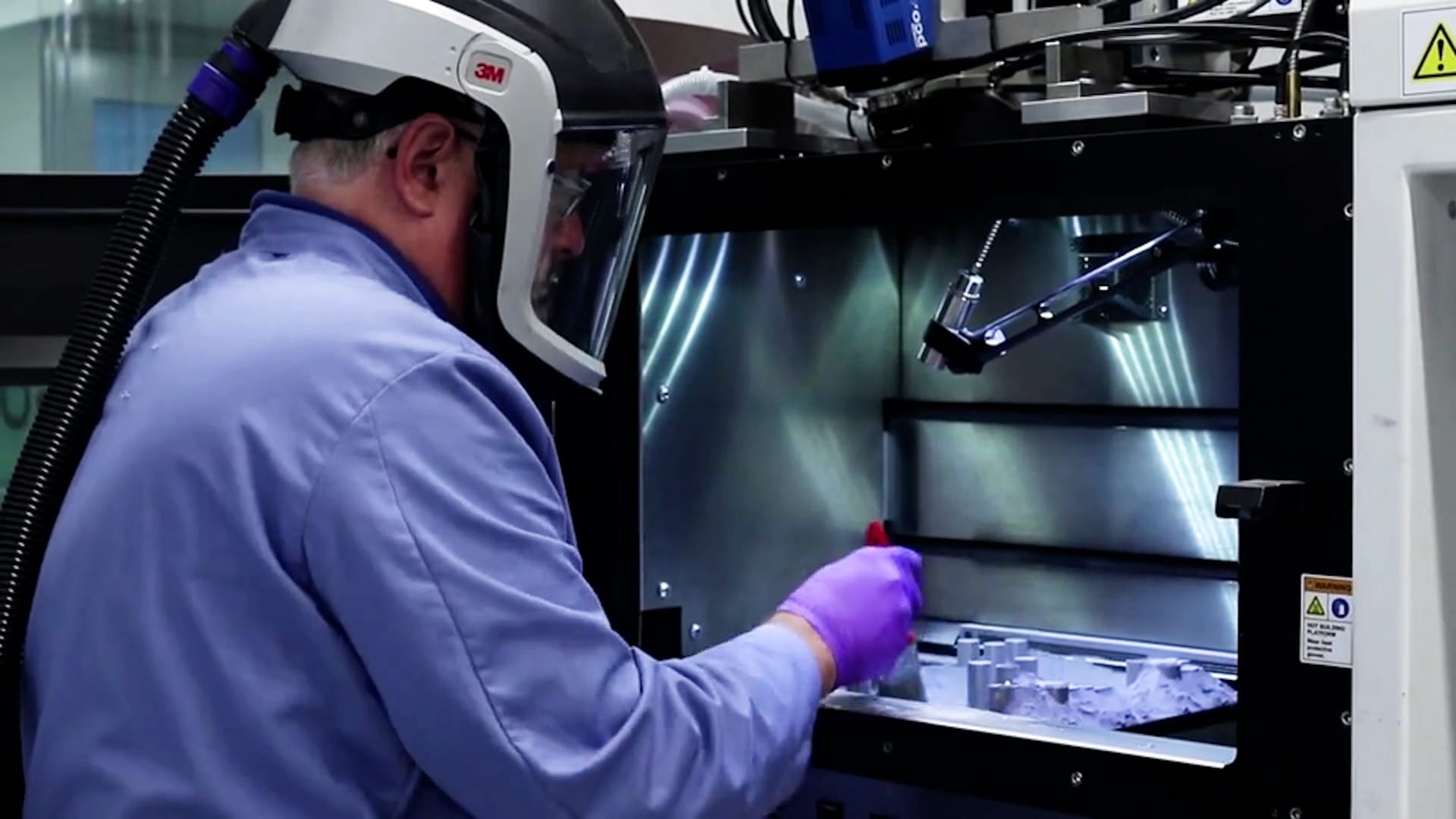 Industrial 3D printing machine producing precision parts